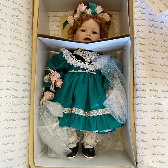 Green and Black Collectible Doll with Accessories